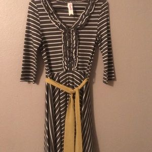 Gray and white ruffle dress.